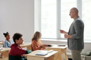 Teacher talking to students